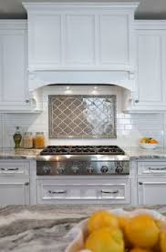 A very light cream ceramic tile backsplash brightens up the rich wood cabinets and the beige granite countertops. 490 Kitchen Backsplash Ideas In 2021 Kitchen Design Kitchen Remodel Kitchen Inspirations