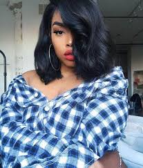 These black choppy layers, teased and combed to the front burst out into mahogany bangs for a chic hairstyle that doesn't need length or curls to be feminine and voguish. Hairstyles Black Women 15 Haircuts