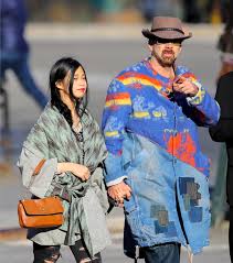 The face/off actor was snapped looking content, clutching his new beau's hand, as well as a huge stuffed whale toy from. Nic Cage Being Nic Cage With His Gf Pics