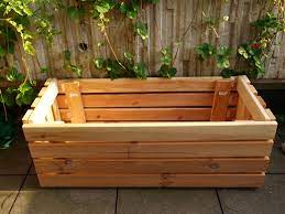 Wooden caddy from bed slats. Upcycle Making A Planter From Bed Frame Slats The Artful Thrifter