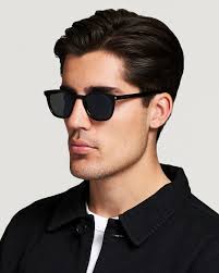 Oliver Peoples Gregory Peck Sunglasses Crystal/Indigo Photochromic at CareO