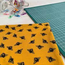 $4.79 quick view new black luxe faux fur fabric price $15.99 quick view Honey Bees Exclusive Organic Cotton Lycra Jersey Knit Fabric Caboodle