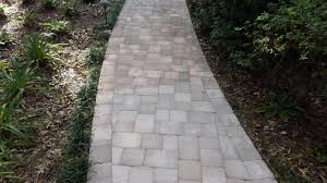 Moss is another determining factor in making pavers slippery, much more than the sealer. Ocala Paver Sealing Services