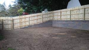 Yard Leveled Out Versa Lok Retaining Wall And Privacy Fence 2 Sloped Backyard Landscaping Retaining Walls Backyard Retaining Walls