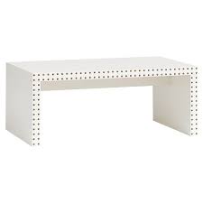 A diy coffee table is an attractive and functional addition to a living room. Emily Meritt White Studded Coffee Table