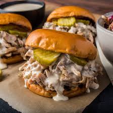 Succulent chicken covered in an addictive bbq sauce, then shredded. Alabama Bbq Pulled Chicken Sandwich Pulled Chicken Sandwiches Bbq Pulled Chicken Sandwiches Pulled Chicken Recipes