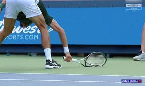 Djokovic throws his racket, narrowly missing a linesman. Novak Djokovic Smashes Racket In Wild Outburst Against Milos Raonic At Cincinnati Masters Tennis Sport Express Co Uk