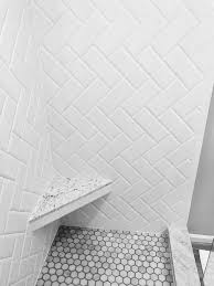 What makes this white subway tile stand out from the rest? Bathroom Subway Tile Shower Herringbone Trendecors