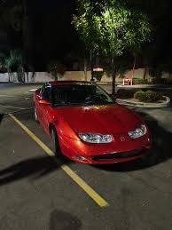 Image result for Bright Red 2002 Saturn