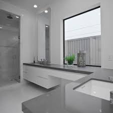 The black cabinetry is perfectly set off by the white benchtop and sink. 50 Grey Bathroom Ideas Grey Bathrooms Bathroom Design Bathrooms Remodel