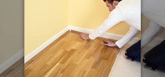 Although there is a risk of swelling and warping, you can fix water damaged laminate flooring in most cases. How To Easily Replace A Damaged Laminate Floor Plank Interior Design Wonderhowto