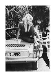 Brigitte bardot photographed by bill ray during the making of shalako (1968) in spain. Brigitte Bardot Poster Auf Einem Auto Desenio De