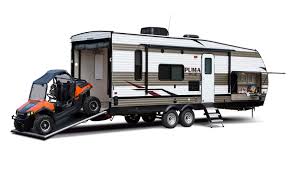 Puma toy hauler with outdoor kitchen. These Rvs Haul The Most Toys Autonxt