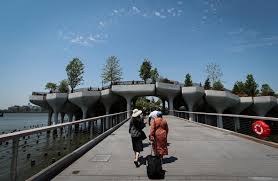 Photographs show little island , the park designed by thomas heatherwick on the hudson river in new york , ahead of its official opening tomorrow. Ietobkhwn3hx6m