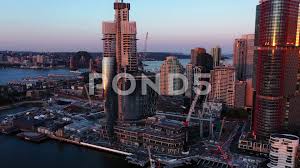 Casino giant crown resorts is not fit to run its $2.2 billion sydney casino because it facilitated money laundering and has other 'deep' problems, a highly anticipated report has found. Sydney Drone Flight Over The Crown Casino At Sunset Stock Footage Ad Flight Crown Sydney Drone Photography Print Stock Video Photo Illustration