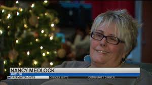 Firefighters, neighbors donate gifts to Woodland Park family