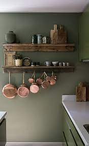 We love how @faithmd's copper pots act as pops of color in her kitchen! For The Love Of Green Copper Pans Wooden Boards Ceramics Copper Kitchen Decor Home Decor Kitchen Copper Kitchen