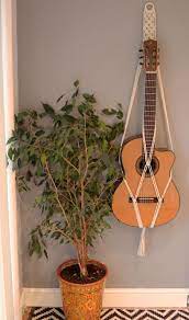 If you're drilling into masonry, you'll need a hammer drill (an electric screwdriver won't cut the mustard here) and the appropriate drill bits for what you're drilling in to. Macrame Acoustic Guitar Stand Wall Decor Wall Mount 100 Cotton Wall Hanger Boho Instrument Hanger Guitar Strap Boho Guitar Gift Guitar Wall Hanger Guitar Wall Guitar Stand Wall