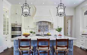 French grey panels are paired with marble counters and that rise up to the backsplash. 11 Modern French Country Kitchen Ideas