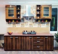 Arched panel doors open a full 180° with pretty bar handles that coordinate with our paulette server. Kitchen Cabinets In Kolkata West Bengal Kitchen Cabinets Kitchen Pantry Cabinet Price In Kolkata