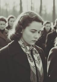 MARGOT FONTEYN. The brilliant, lambent star of London's Sadler's Wells  Ballet Company, wearing a black satin brocade evening dress designed for  her by Bianca Mosca of London. She wore it to a