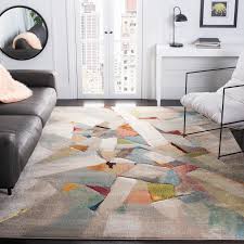 Use wallpaper with striking geometric patterns, complex motifs, and vivid colors. Safavieh Porcello Gennady Mid Century Modern Abstract Rug Overstock 15313952