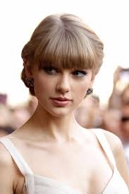 Taylor Swift's Signature Bangs Signify Their Own Eras