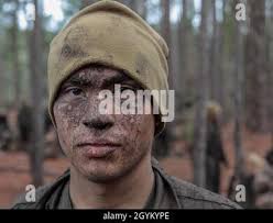 Kevin Ariel Reyes a recruit with Alpha Company, 1st Recruit Training  Battalion, poses for a photo after completing an obstacle during the  Crucible at Marine Corps Recruit Depot Parris Island, S.C., Jan.