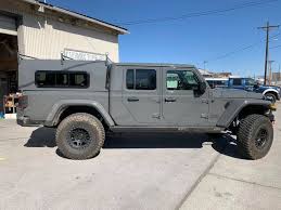 Leitner designs had a large hard shell tent mounted to their overland gladiator on display. New 2020 Jeep Gladiator With A Caravan Caravan Tops Mfg Facebook