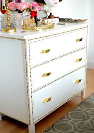 I remember friends telling me to buy the stained white version because it repelled stains a lot more than the plain white version. Gold Nailhead Ikea Dresser Makeover Before After