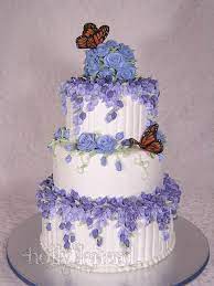 They imprint a fantastic pattern onto the icing which i painted with food colouring to match the flowers, and finished with a good spritz of gold shimmer spray. Lilac Butterfly Cake By Ilexiapsu On Deviantart