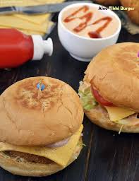 Aloo Tikki Burger Recipe Macaloo Tikki Burger Indian Style Aloo Tikki Burger Recipe Food Burger Recipes Recipes