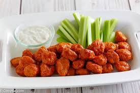Add the trimmed chicken wings to a bowl with buttermilk and hot sauce. Boneless Buffalo Chicken Bites Wings