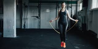 When you're sizing up your rope or when you're picking it out, you want to step in the middle of it, pull it up to the sides, right under your armpit. How Long Should A Jump Rope Be Openfit