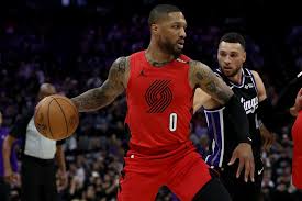 Portland Trail Blazers and Los Angeles Lakers players competing in an NBA game