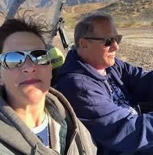 Who can I contact to reserve a camp site at the fair grounds?