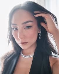 Inspired by legendary designer Jean Schlumberger's iconic brooch, this  Schlumberger by Tiffany & Co.™ Golden Fish watch in 18k rose gold features  over 765 diamonds, totaling over 5 carats. 10 round emeralds