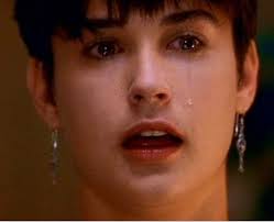 I don't know how many times I've seen the movie, but when Murphy dreams, I  just noticed that there is a tear in his neck 🙂