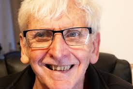 DAVID'S PHOTOGRAPHIC SMILE.