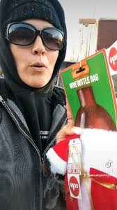 A new dollar store wine bottle bag use! #santa #costume #costumeideas  #dollarstore #dollarstorefinds #diyproject #diy #cute #savemoney #duck #pet  #petcostume