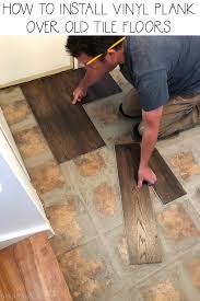 In rare cases, a homeowner will install a new vinyl floor over an existing one. How To Install Vinyl Plank Over Tile Floors The Happy Housie