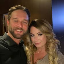 How to remove a dead raccoon from a busy street in Whitby?