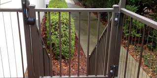 Crew installing fence and showing some tips and tricks on installing gate in the field. How To Build A Gate For Your Wooden Deck Or Composite Deck Using Beautiful And Sturdy Deck Railing Materials Such As Aluminum Or Vinyl Decksdirect