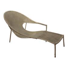 Sinuous Asymmetric And Low Slung Lounge Chair Of Woven Plasticized Wicker Over Galvanized Iron With Brass Feet Wicker Lounge Chair Deck Furniture Lounge Chair