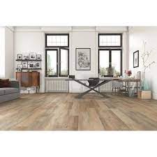 Though lowe's brand is owned, many manufacturers now have the license to produce the flooring. Allen Roth Urbanite Oak 7 55 In W X 50 62 In L Water Resistant Embossed Wood Plank Laminate Flooring 23 92 Sq Ft Lowes Com Laminate Flooring Wood Planks Flooring