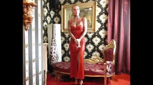 Clipspool | Miss Francine bound and gagged in a long red Latex dress