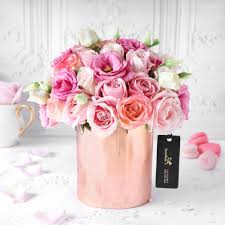 The white rose at a wedding carries the message of new beginnings and purity. Rose Gold Splendour Bouquet Order Birthday Flowers Online Interflora India