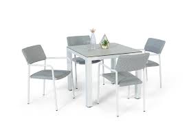 Kitchen chairs with angled legs present an appeal that differs from traditional straight legs. Dining Table And Four Chairs At The Kitchen Table Square Dining Suite White Home Kitchen Dining Room Furniture