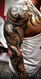 Batista was already pretty covered in tattoos and he's any makeup artist's nightmare on set when let the conspiracy theory videos about dave bautista's involvement in the illuminati start flooding. 13 Tattoo Sleeve Designs Ideas Tattoo Sleeve Designs Dave Bautista Tribal Arm Tattoos