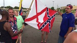 The first national flag of the confederate states of america was created in 1861 and had seven stars to represent the breakaway states of south carolina, mississippi, florida, alabama, georgia. Video Shows Alabama Black Man Accepting The Confederate Flag Youtube